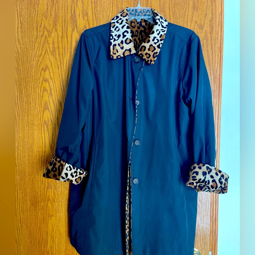 Reversible black and animal print trench coat.
